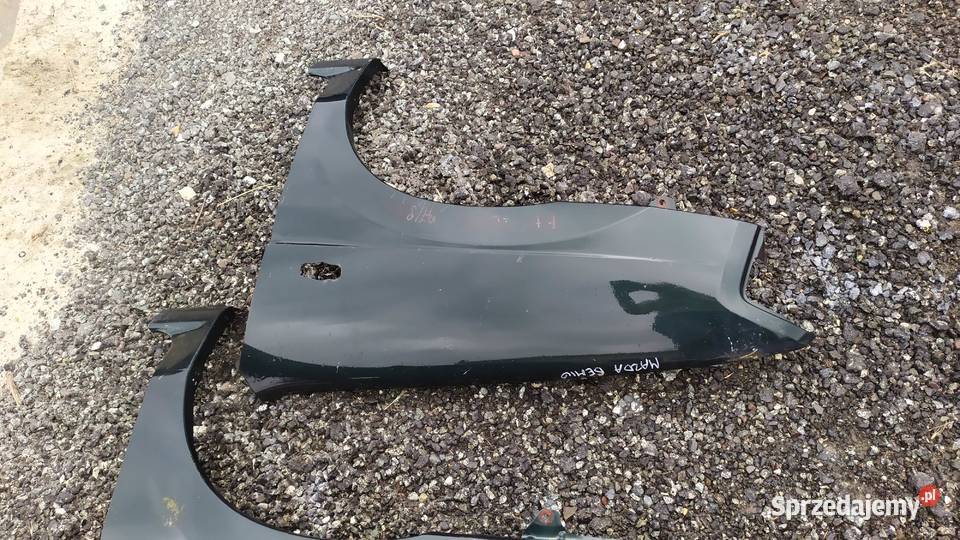 Mazda demio 1997 1998 1999 błotnik lewy