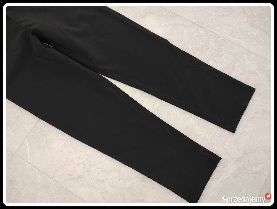 Czarne spodnie legginsy na gumce elastyczne 40 L Bez wzoru Płock