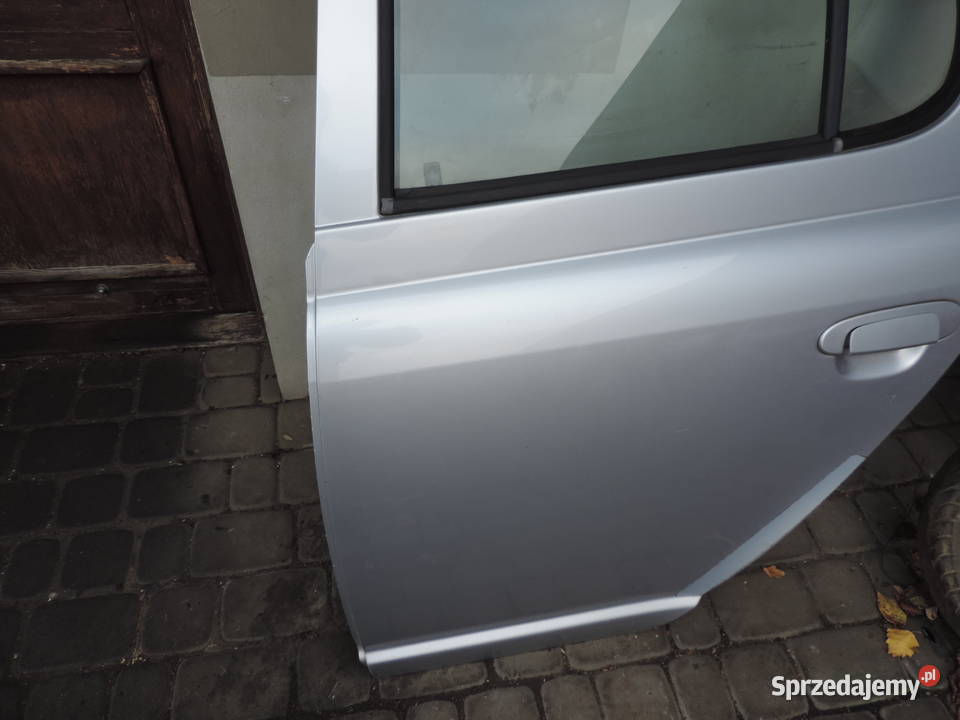 DRZWI LEWY TYŁ TOYOTA YARIS 1 KOLOR 199 Nowy Sącz