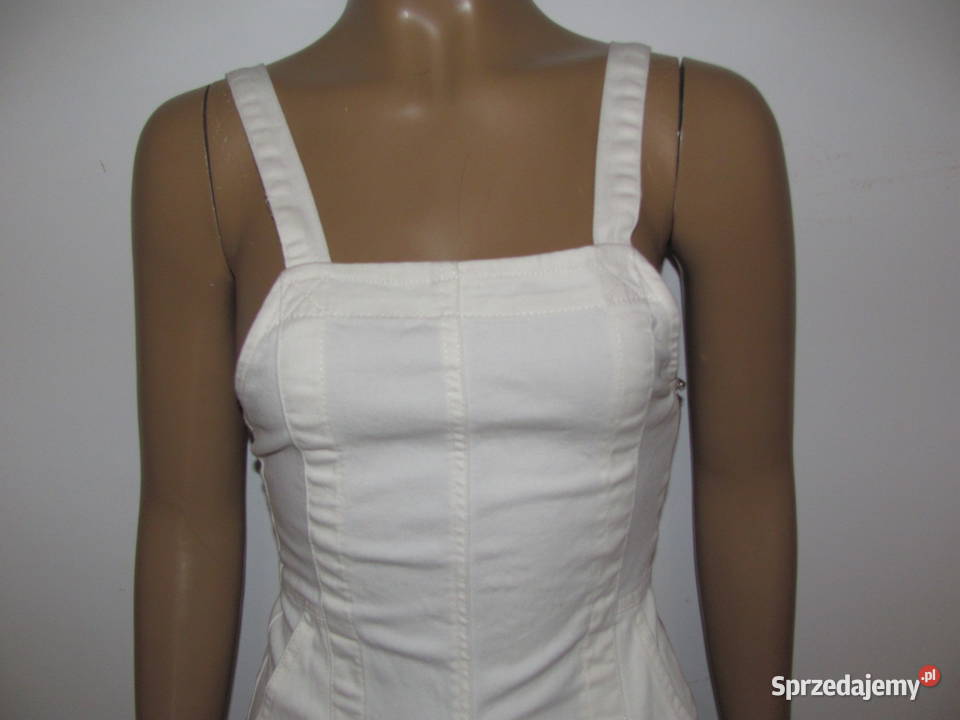 Kombinezon bez rękawów dzwony kremowe spodnie Zamość sprzedam