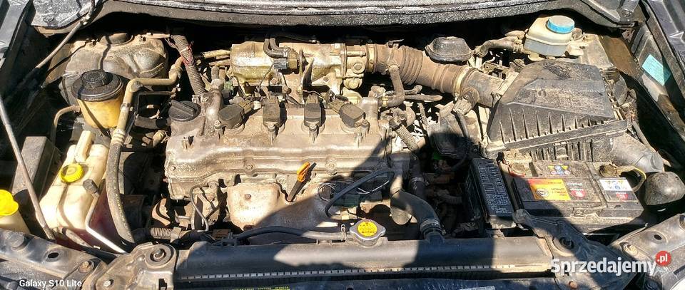 Nissan Almera Tino 18 benzyna klimatyzacja radio Karpin