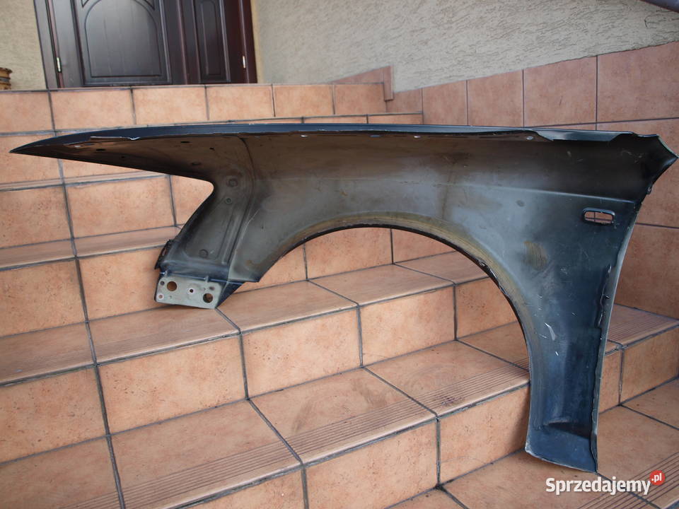 Audi A6 C6 błotnik prawy przód 2004 2008r osobowe Błotniki