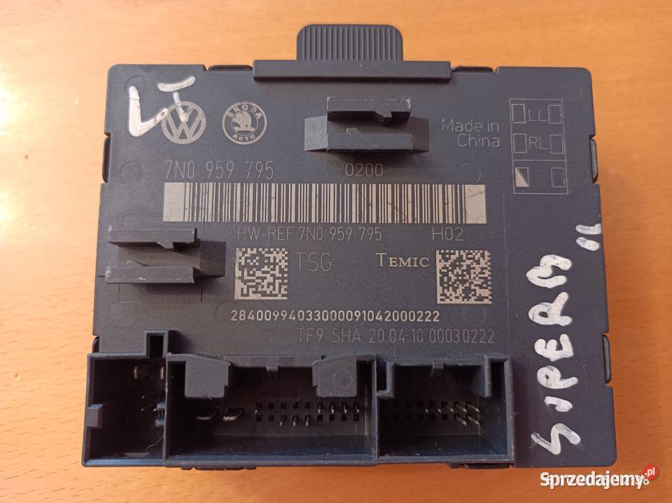 Modułsterownik drzwi lewy tył 7N0959795 Skoda Łomianki