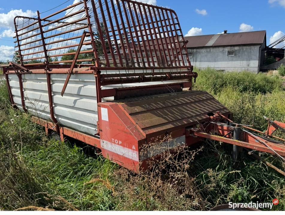 Przyczepa samozzbierajaca rozrzutnik Kikół