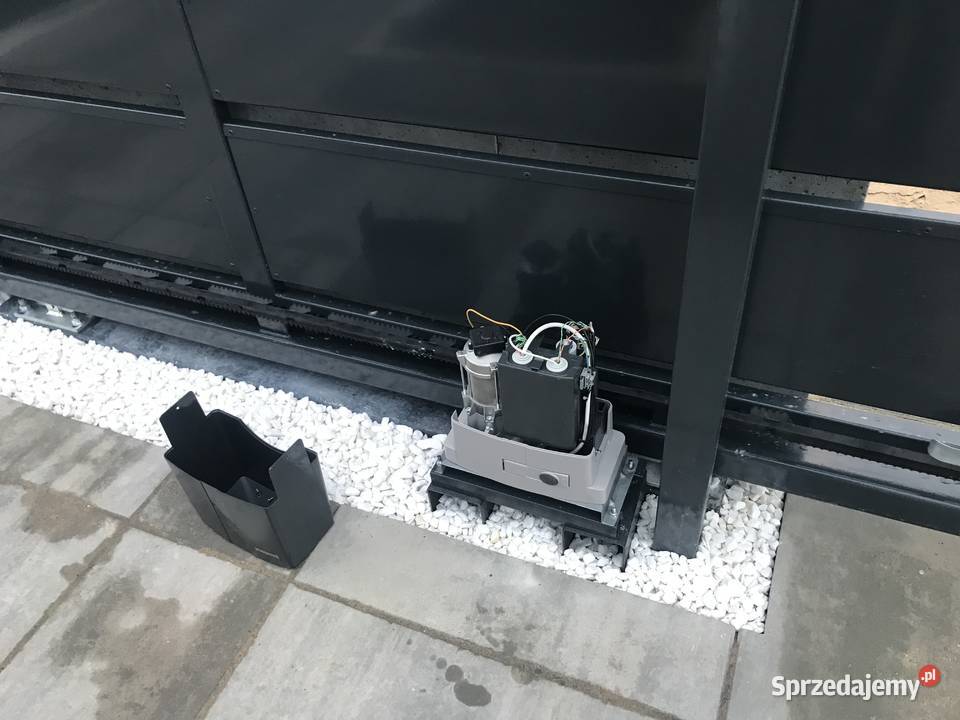 BRAMY GARAŻOWE segmentowe rolowane naprawa Remont i budowa Łomianki Dolne
