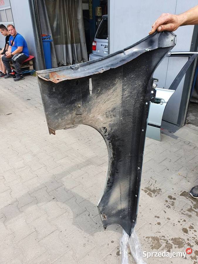 Blotnik Przedni Lewy BMW E39 Kolor glacier grun