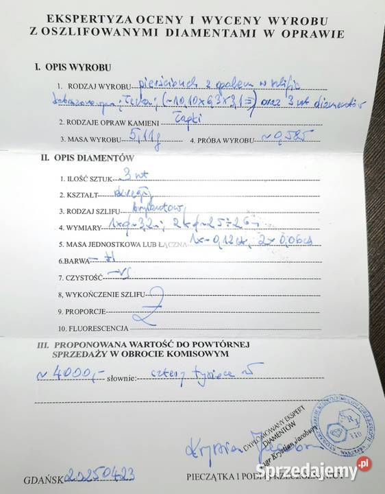 Złoty pierścionek z diamentami i opalem próby Elbląg