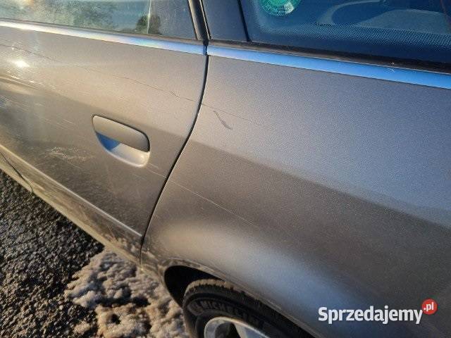 Klamka zewnętrzna lewy tył Audi A6 C5 2002 LY7Q Szczerbice