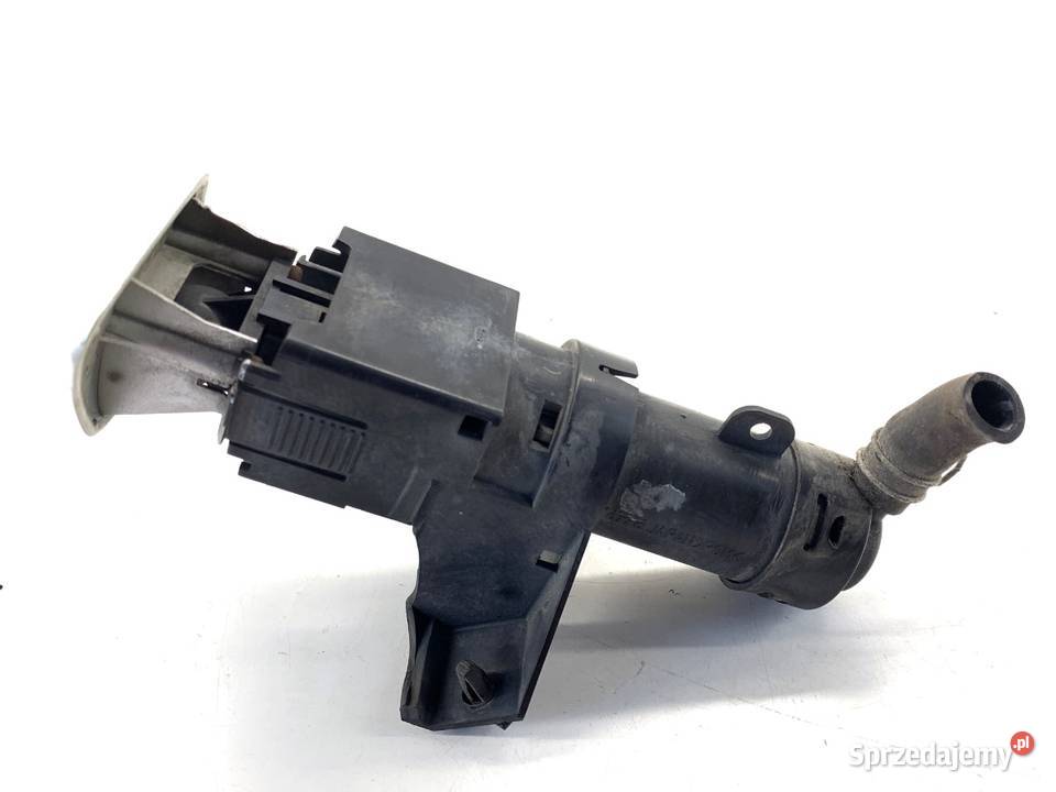 SPRYSKIWACZ REFLEKTORA LEWY PRZÓD MITSUBISHI