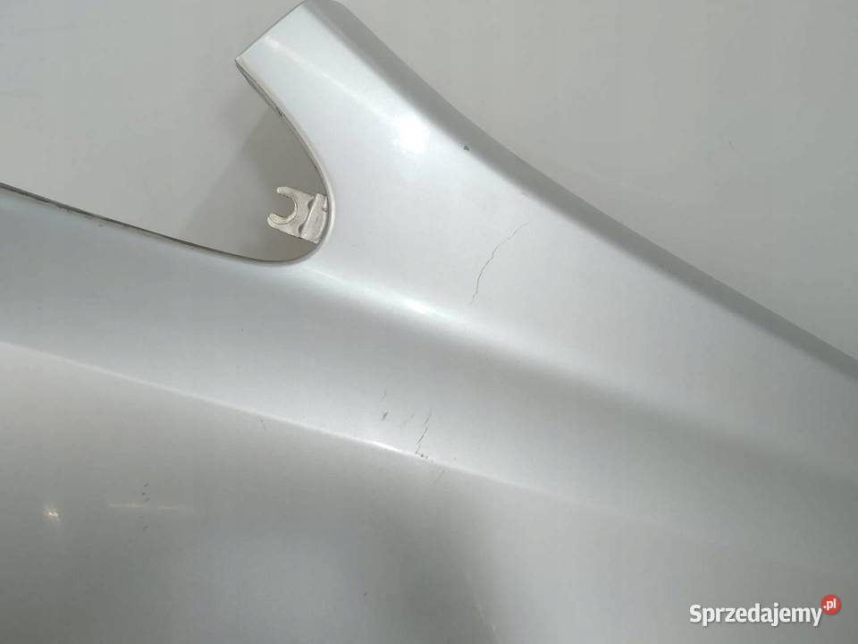 BŁOTNIK PRAWY PRZÓD SREBRNY Z157 Opel Zafira II