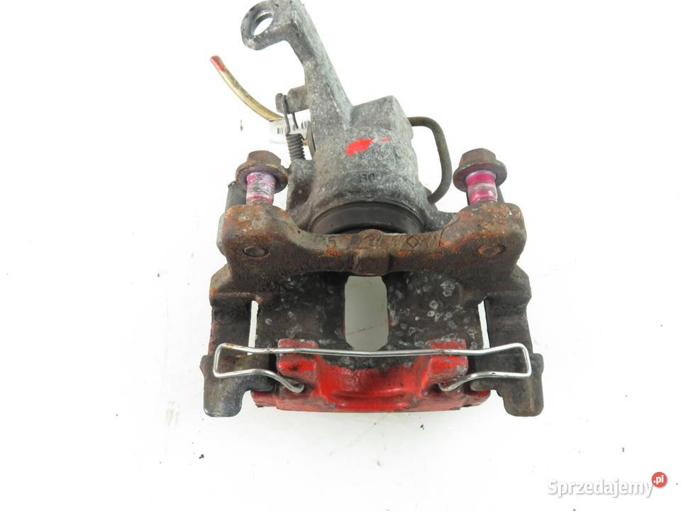 ZACISK LEWY TYŁ JAGUAR XF X250 27 TDV6