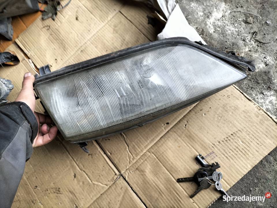 LAMPA PRAWA PRZÓD OPEL VECTRA B Oświetlenie Kamień-Kolonia