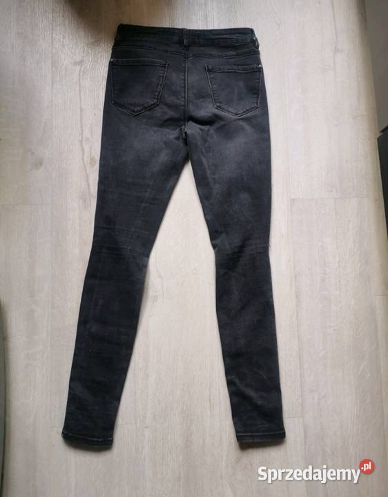Spodnie jeansowe z dziurami Spodnie małopolskie Kraków