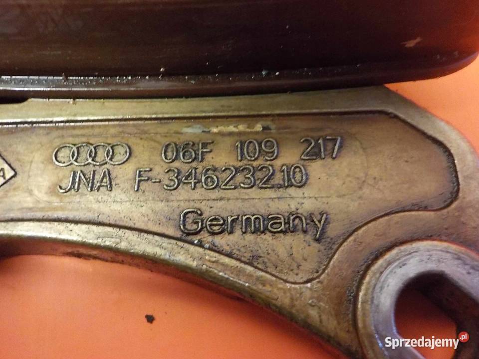 OCTAVIA II 20 FSI 05 napinacz slizg 06F109217 Rozrząd Suków