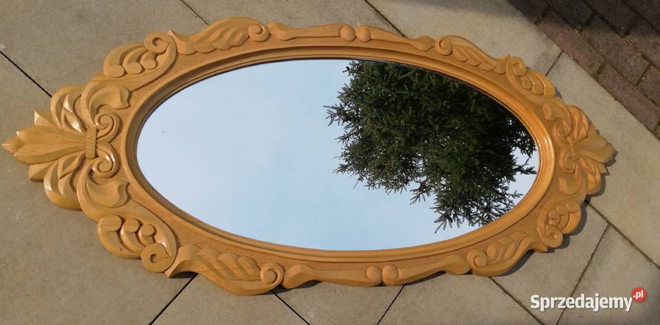 Lustro owalne w drewnianej rzeźbionej ramie