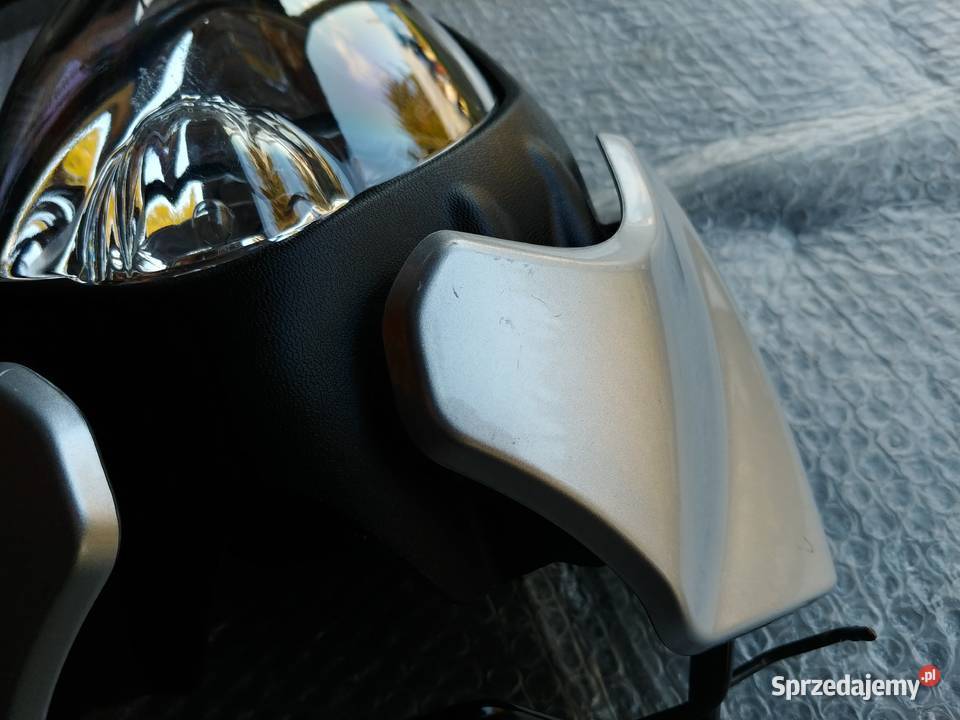 Lampa reflektor stelaż przód Suzuki SFV 650