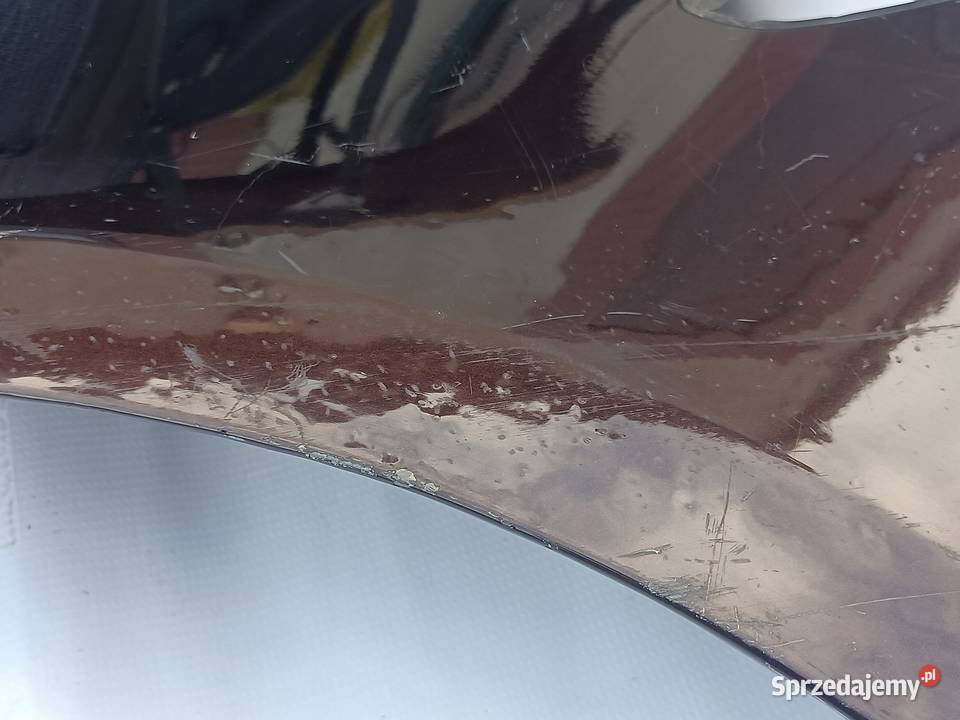 BŁOTNIK LEWY PRZEDNI OPEL ASTRA V K 15 PRZÓD MK7 Przemęt