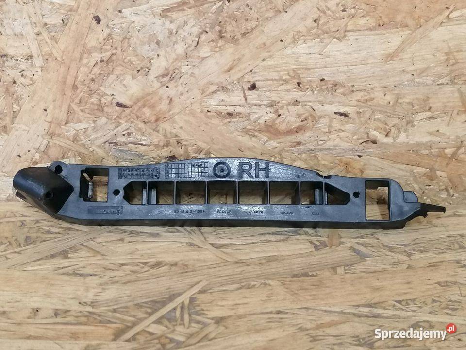 OPEL CORSA E ŚLIZG ZDERZAKA PRAWY PRZÓD 39014303 osobowe Pozostałe Pleszew