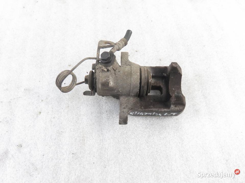 ZACISK LEWY TYŁ AUDI A4 B5 19 TDI