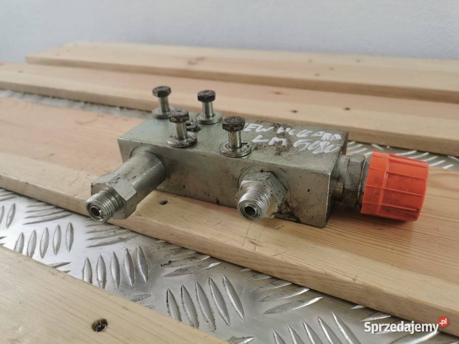 Holland LM 5080 Zamek cylindra wysypu wielkopolskie sprzedam