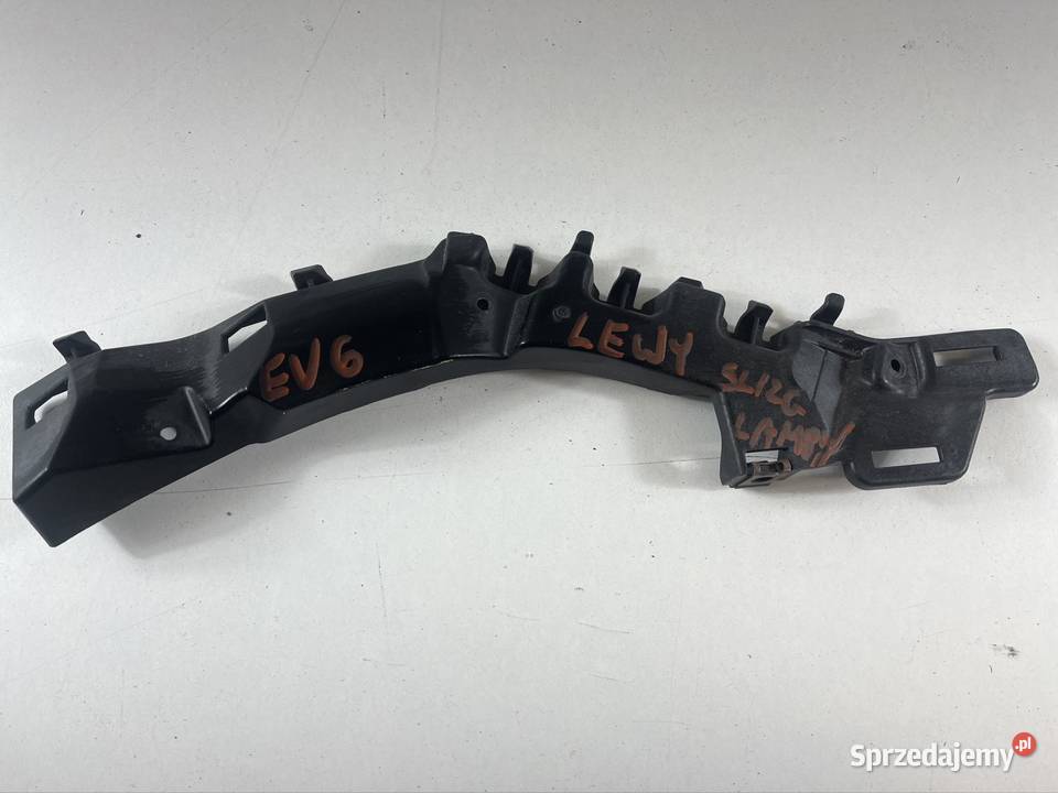 KIA EV6 2022 UCHWYT REFLEKTORA LEWY PRZÓD Pozostałe Międzychód