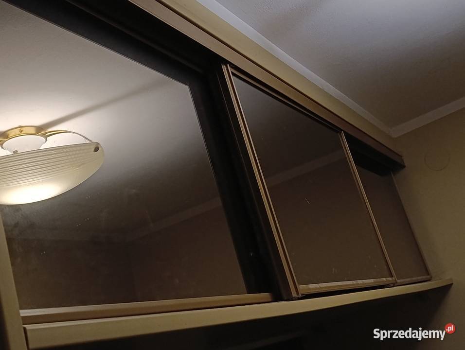 pawlacz z drzwiami przesuwnymi szklanymi Poznań