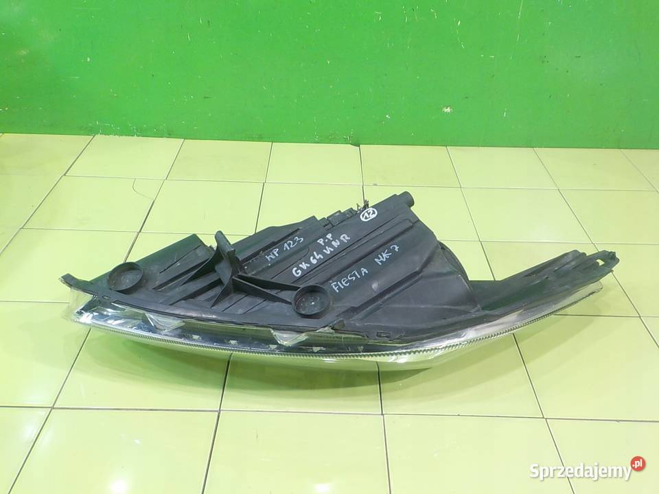 FORD FIESTA MK7 125B 14r lampa prawa przod Suków