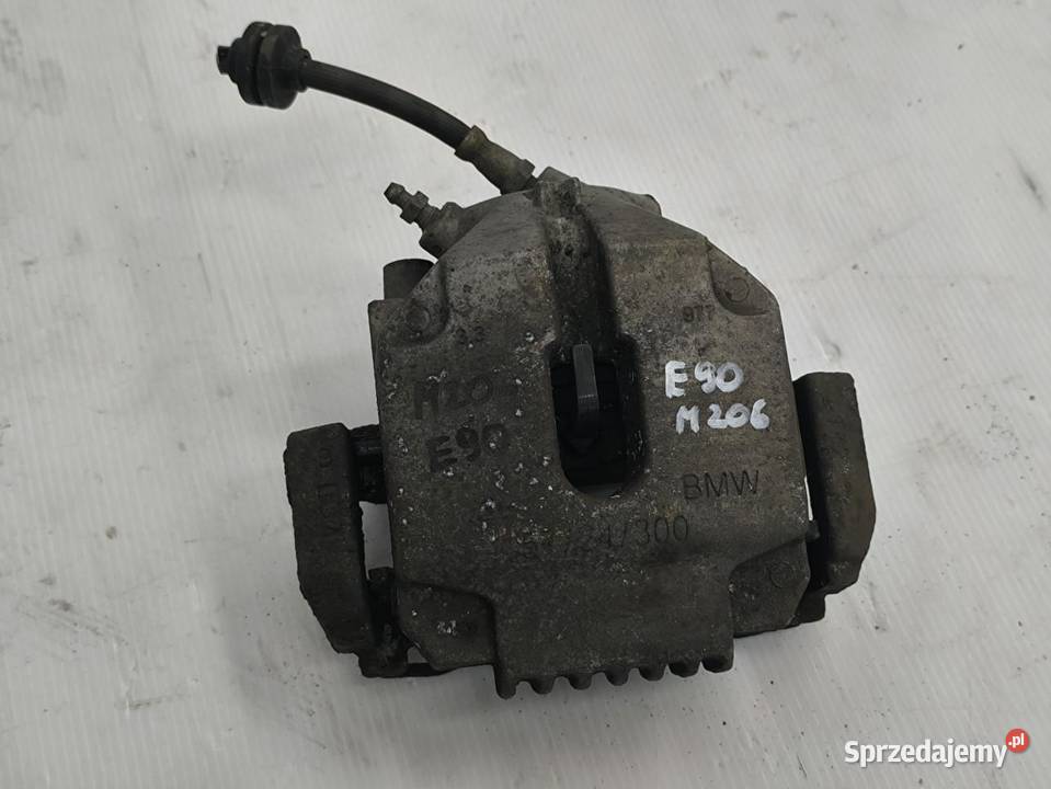 ZACISK LEWY PRZÓD BMW E90