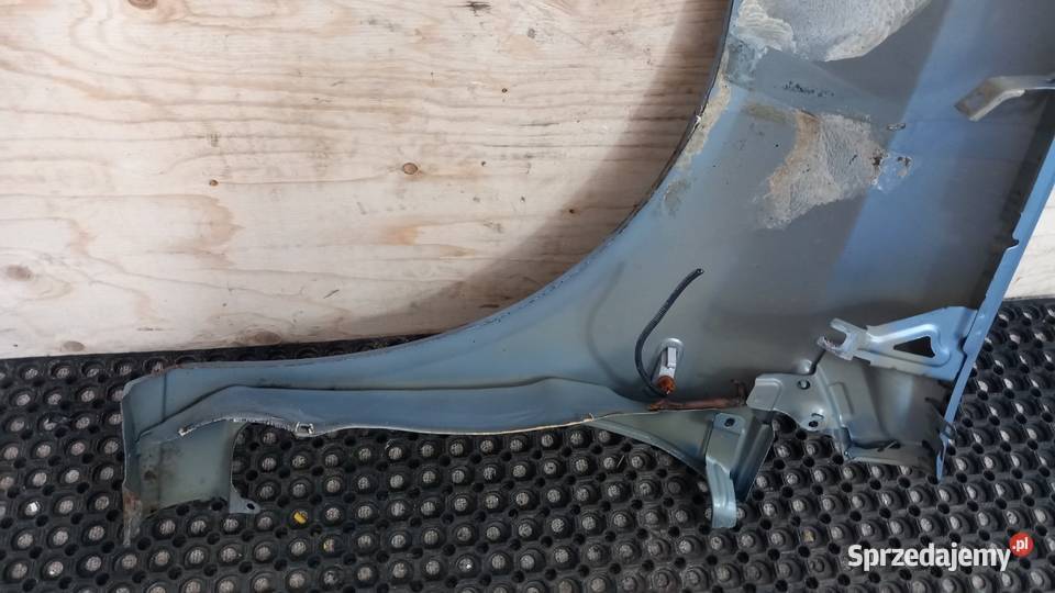 FIAT GRANDE PUNTO EVO BŁOTNIK PRZÓD PRAWY 457B Błotniki Zbierkowo