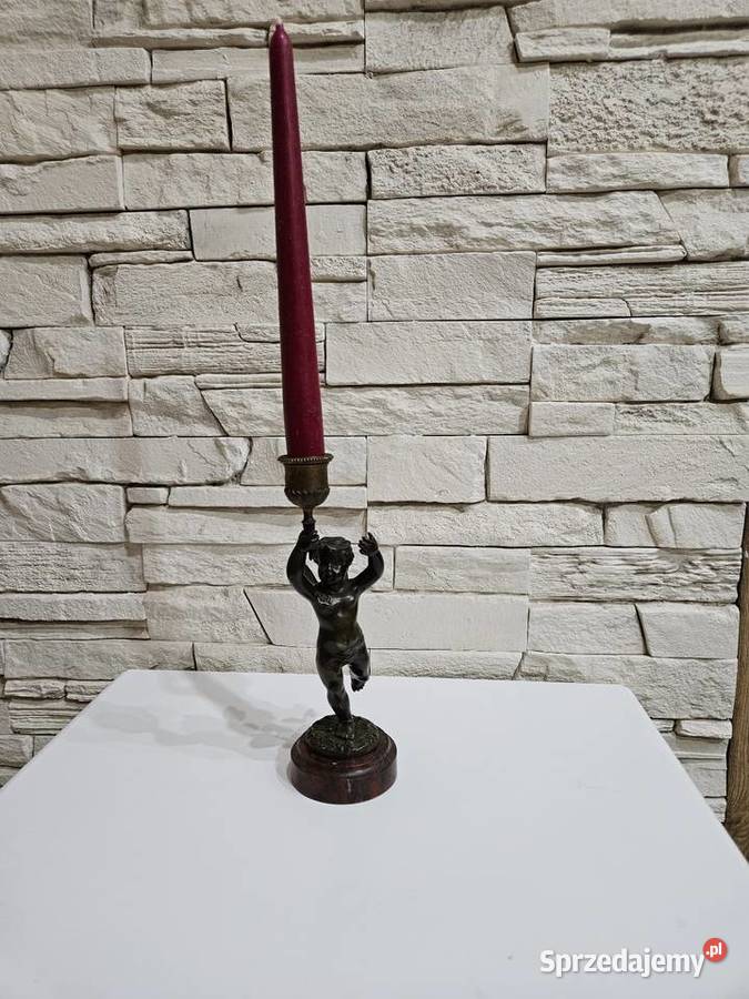 Świecznik brąz Francja XIX w Figurka Putto Kowal sprzedam
