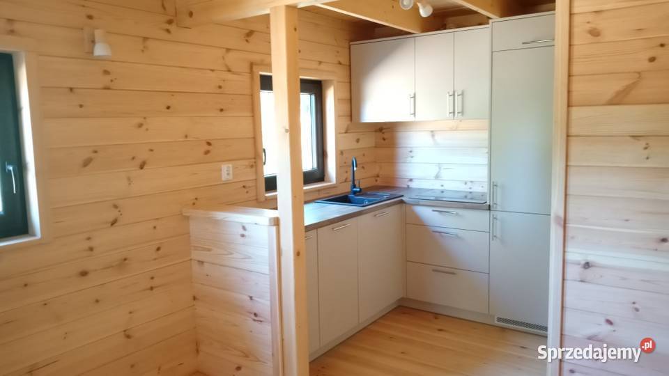 Sprzedam działkę 1080m2 z nowym domem 92m2 w