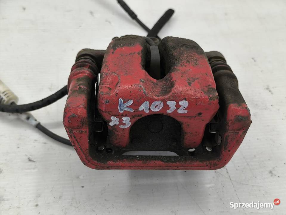 ZACISK HAMULCOWY LEWY TYŁ BMW E90 20i osobowe