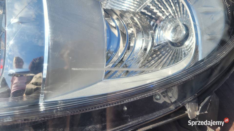 FIAT GRANDE PUNTO EVO 09 LAMPA LEWA PRZÓD Ruda Śląska