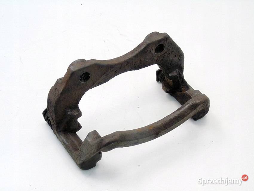 Jarzmo zacisku hamulcowego lewy przód Nissan Sosnowiec
