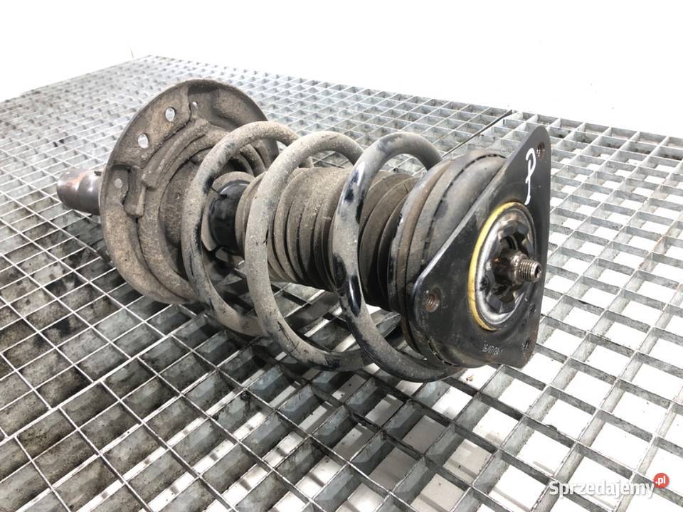 AMORTYZATOR PRAWY PRZÓD ZE SPRĘŻYNĄ RENAULT