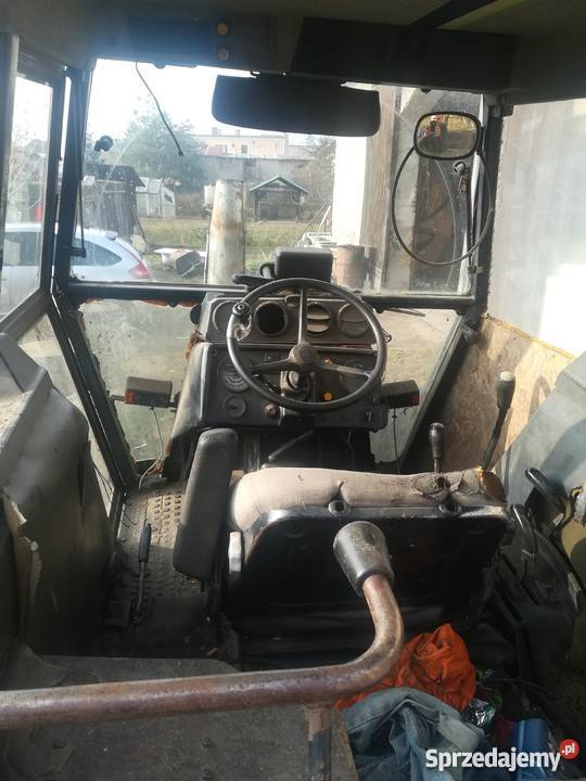 ciagnik do lasu z chwytakiem do drewna Łódź