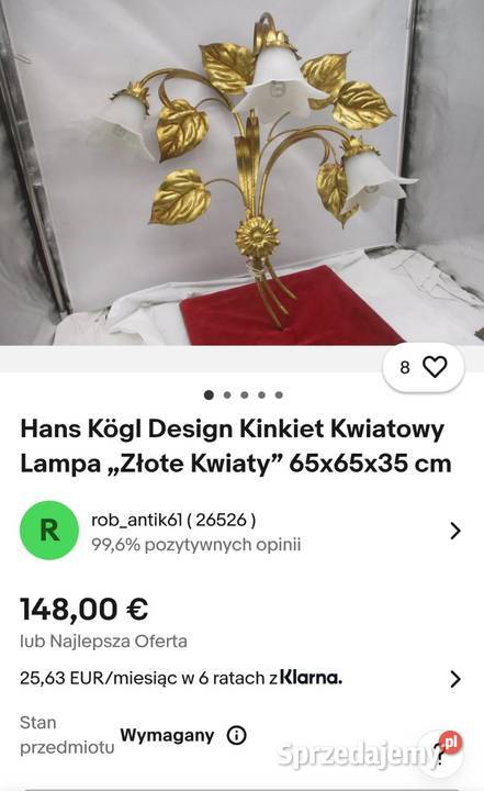 Hans Kglzłota lampa designerskaw kształcie łódzkie