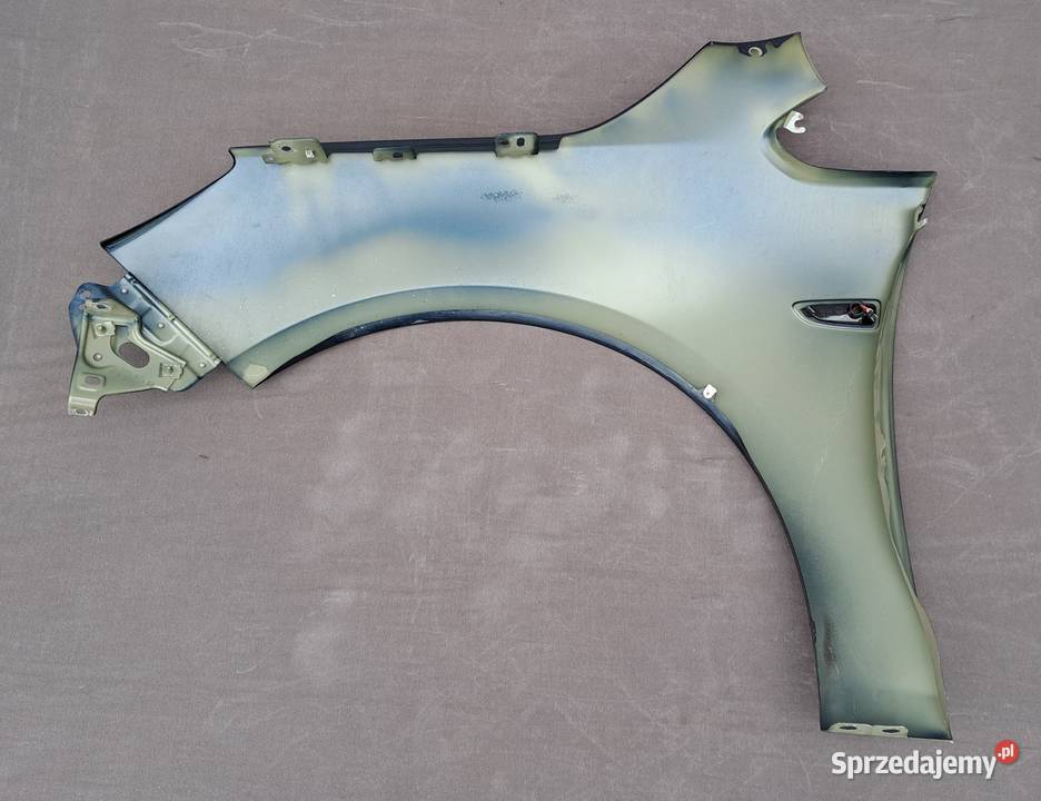 Błotnik prawy przód Opel Astra J 0915 Z22A Mielęcin