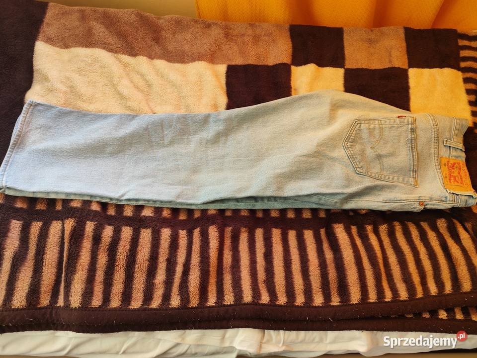 Spodnie Levis 501 jasno niebieskie W38 L30 stan Szadek