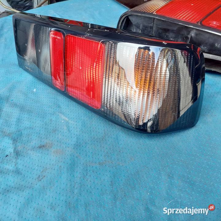 Ford sierra sedan lampy tył ciemne blenda prawa Lampy tylne Piaseczno