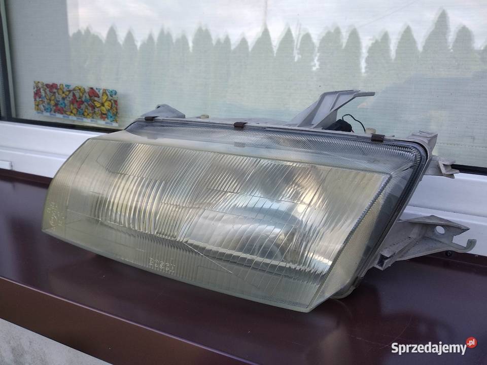 Mazda 323p BA lampa przednia lewa reflektor osobowe łódzkie