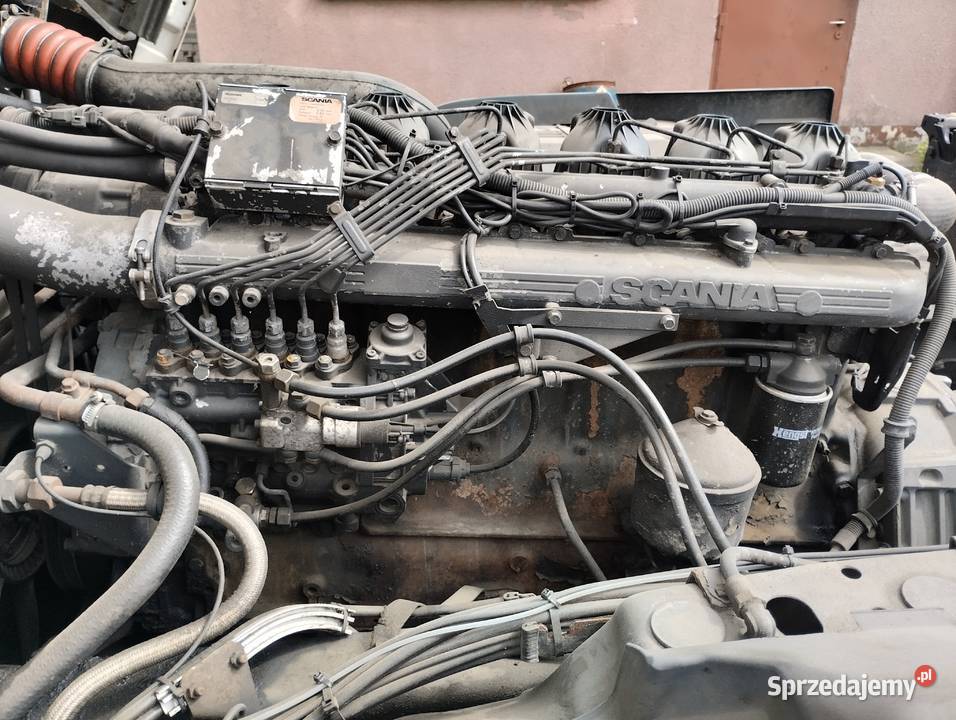 SCANIA 94L 300 samochód do przewozu kontenerów Marki