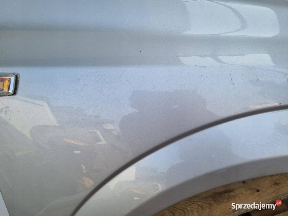 Opel Astra III H HTB sedan kombi 0409r PRZEDNI Rudka