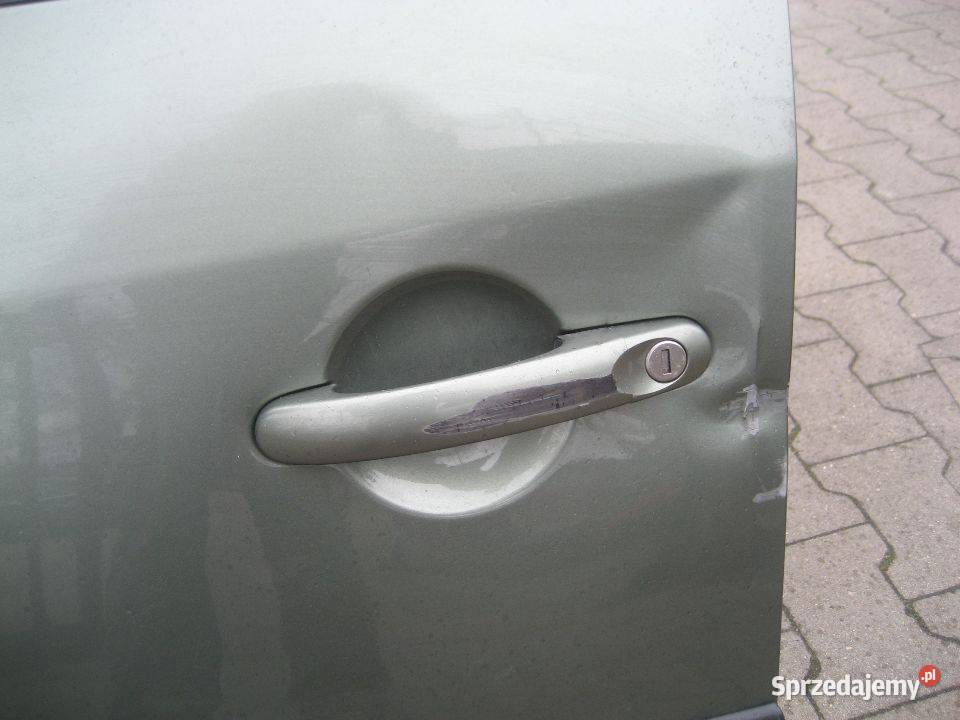 vw caddy 0314r drzwi przód lewe uszkodzone wielkopolskie Rakoniewice