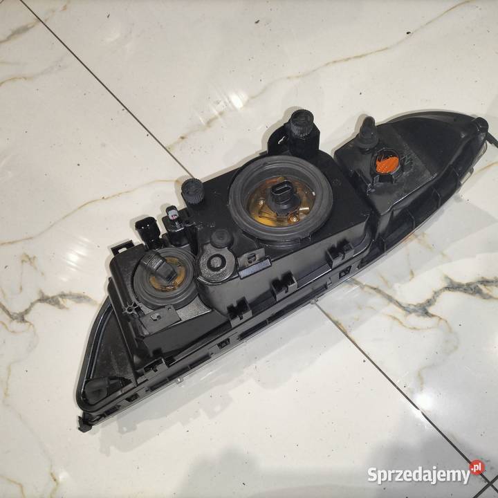 Lampy przednie BMW E39 Oryginał BMW HELLA stan osobowe Poręba