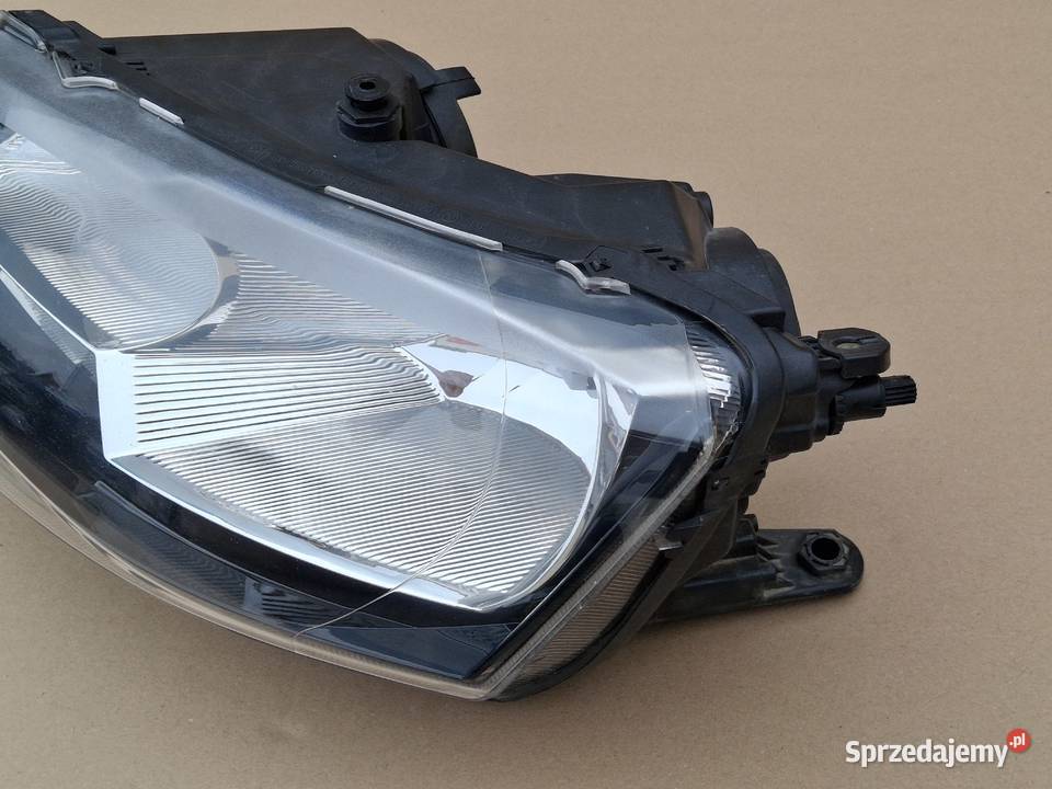 SKODA RAPID REFLEKTOR LEWY H7 LAMPA LEWA osobowe Bieleń