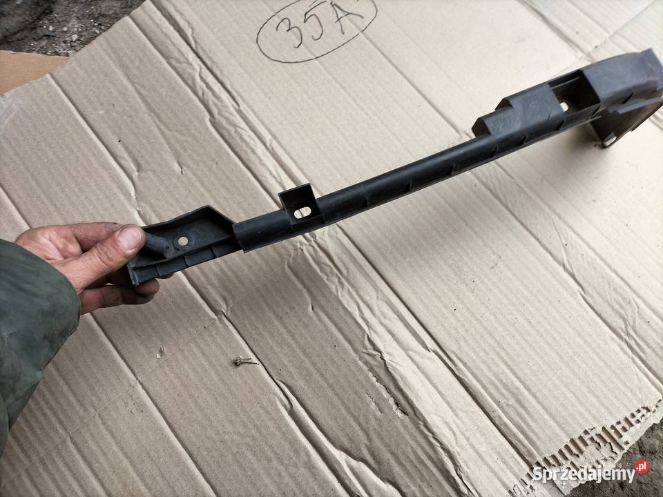 VW T4 7D0807394 UCHWYT ŚLIZG MOCOWANIE ZDERZAKA Kamień-Kolonia