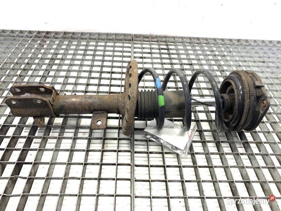 AMORTYZATOR LEWY PRZÓD ZE SPRĘŻYNĄ NISSAN NOTE Amortyzatory