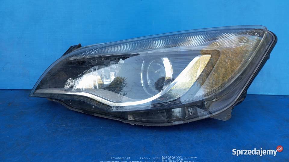 LAMPA LEWY PRZÓD REFLEKTOR EU XENON OPEL ASTRA Lampy przednie Nowy Tomyśl