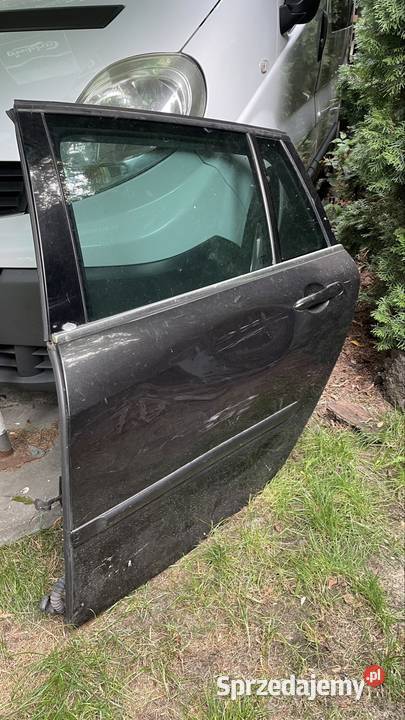 DRZWI lewe tylne RENAULT LAGUNA III NV676 5D Konstancin-Jeziorna